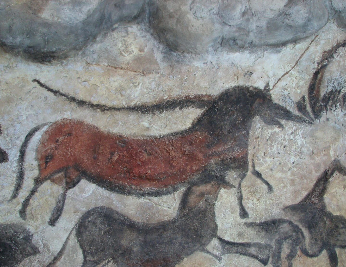 Lascaux cave-art replica, Anthropos Museum, Brno · HTO · Public domain Museum replica of painted animals from Lascaux; this is not the original cave surface.